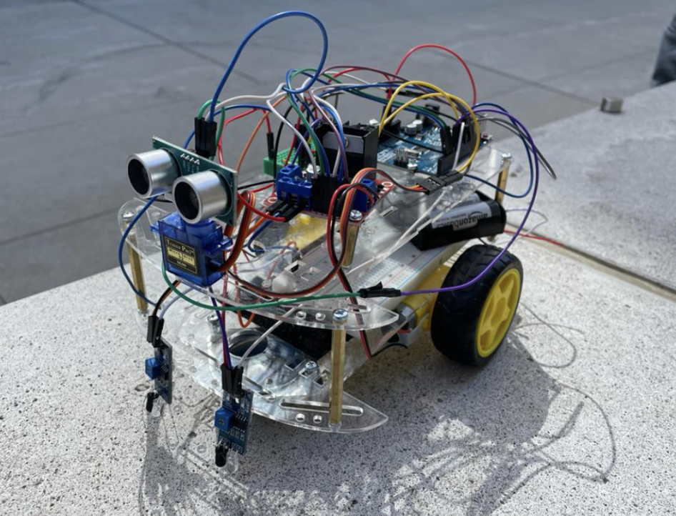 Autonomous Mini-Car with IR and Ultrasonic Navigation